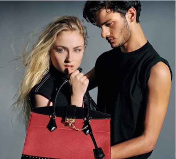 Sophie Turner lets her Louis Vuitton Petite Boite Chapeau Bag meet