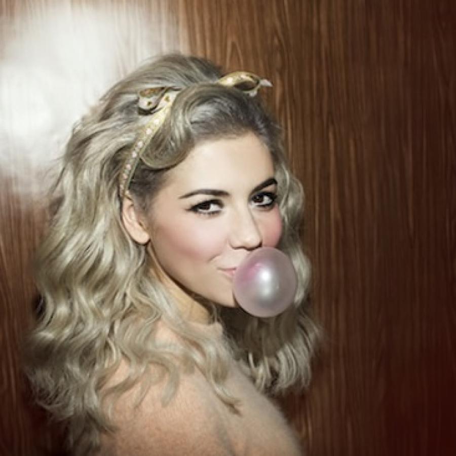 Marina blowing a bubble, with the diamonds